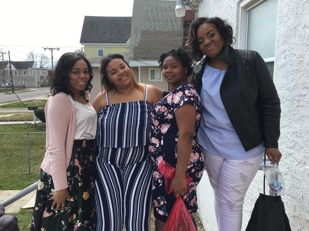 Ladies of the ministry standing together after service