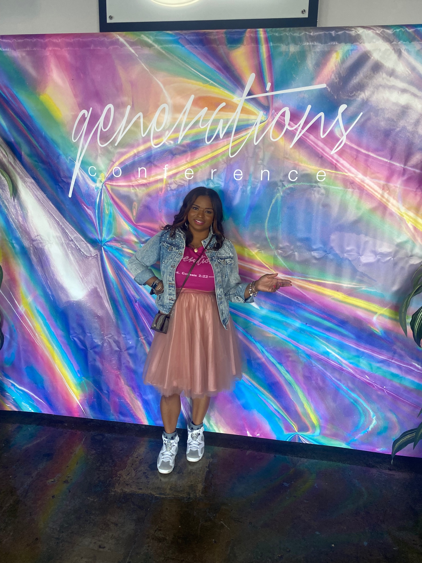 Sister at the Generations Conference backdrop