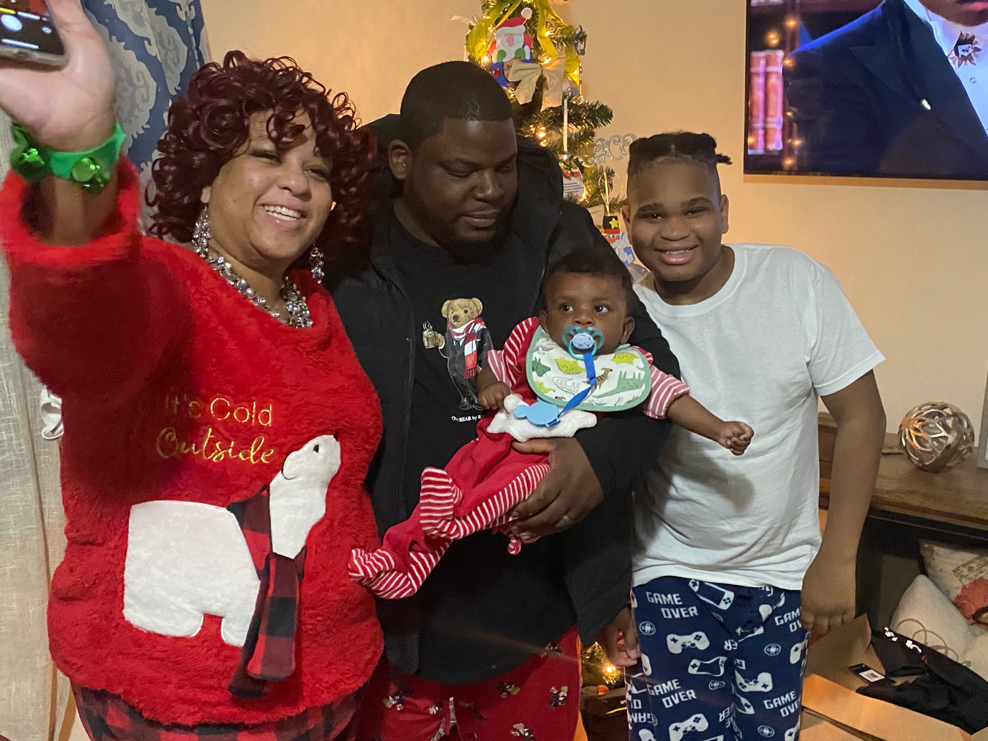 Family celebrating Christmas together at home