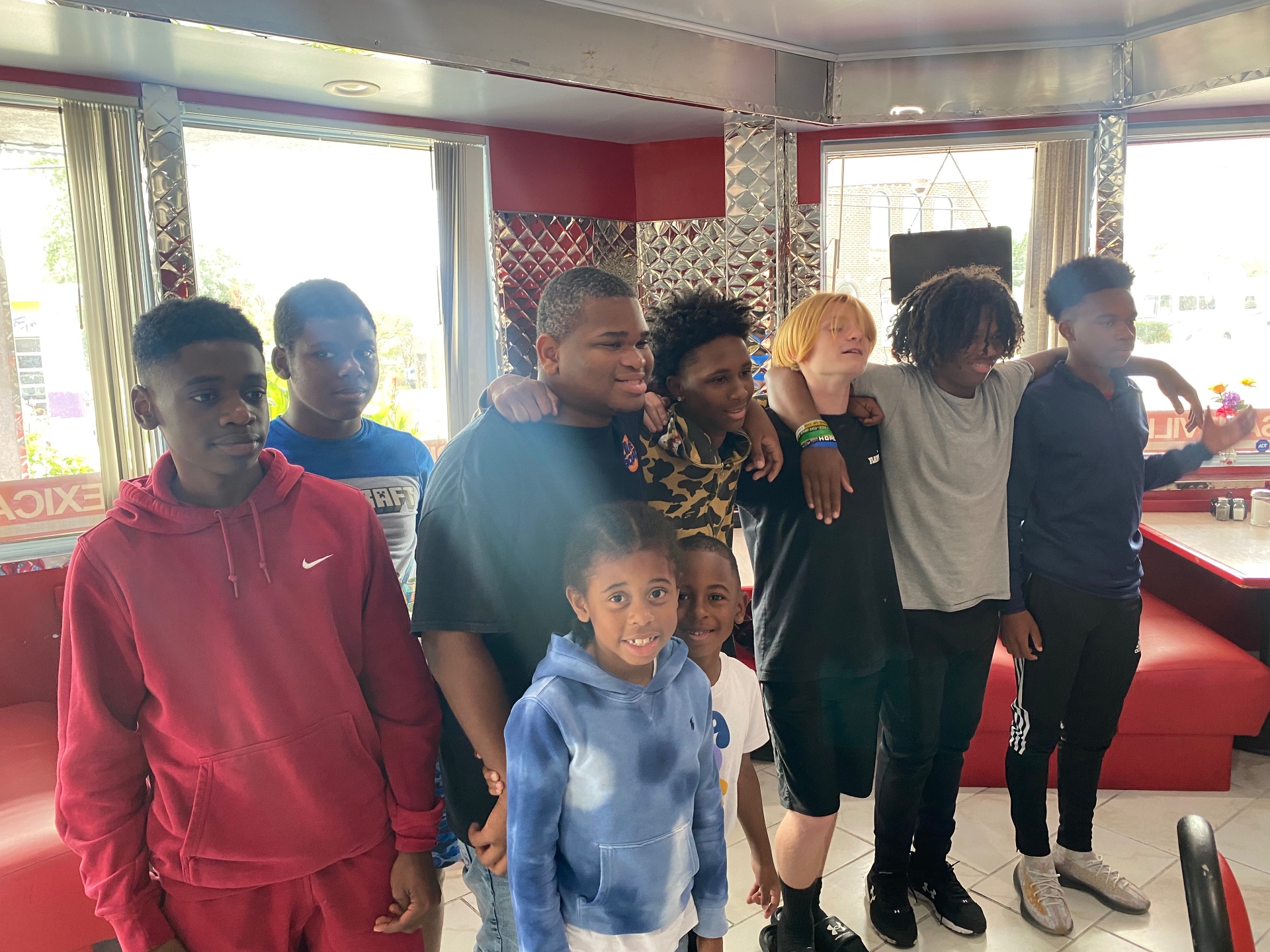 Youth group gathered for a meal at a local diner